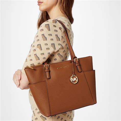 michael michael kors jet set travel tote bag|Michael Kors jet set duffle.